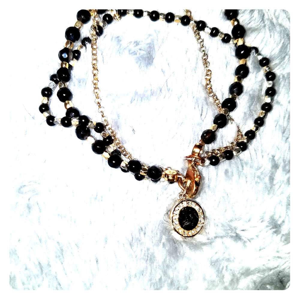 gold  plated and onyx bracelet